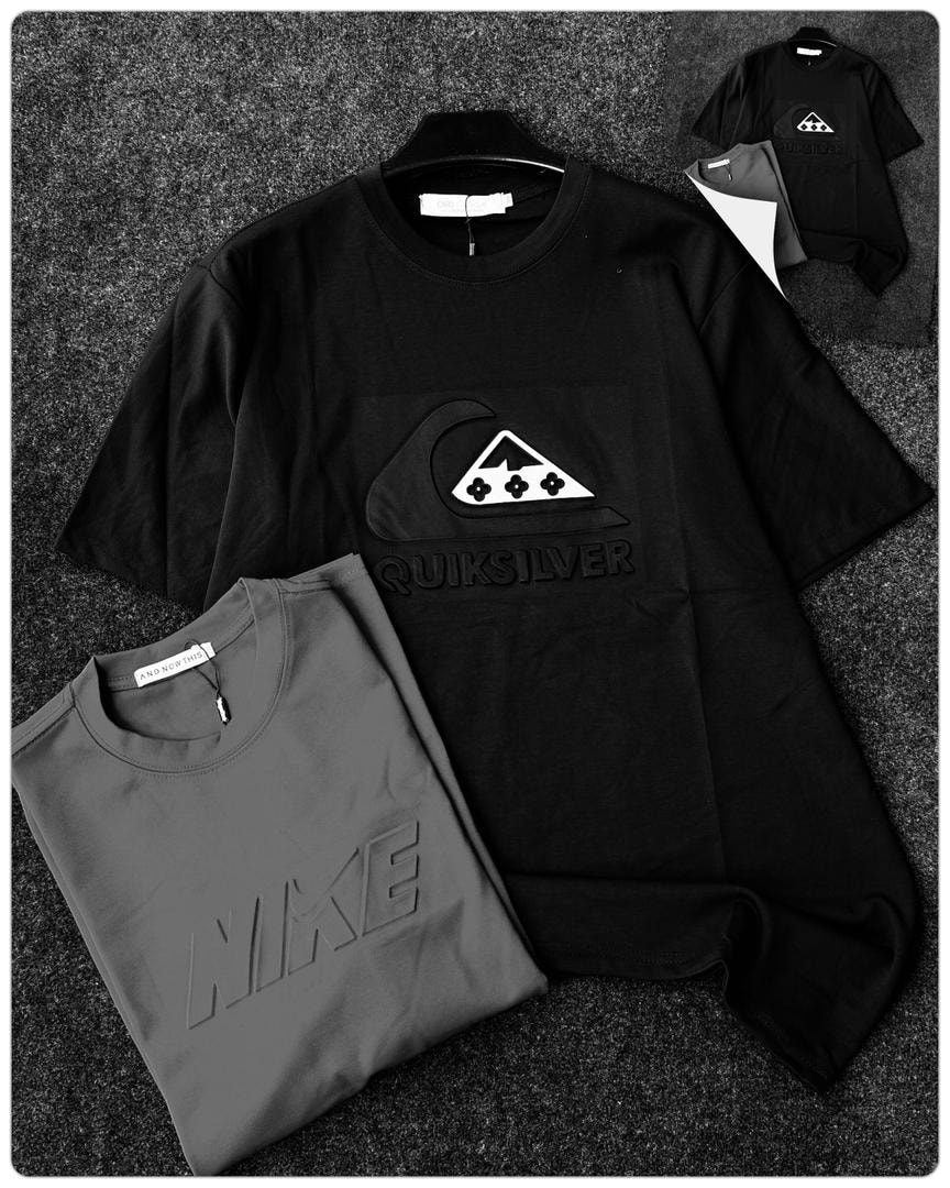 Black Quiksilver round neck t-shirt displaying embossed wave logo.