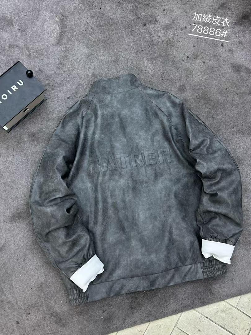 Back view of dark gray faux leather bomber jacket showing embossed detail.