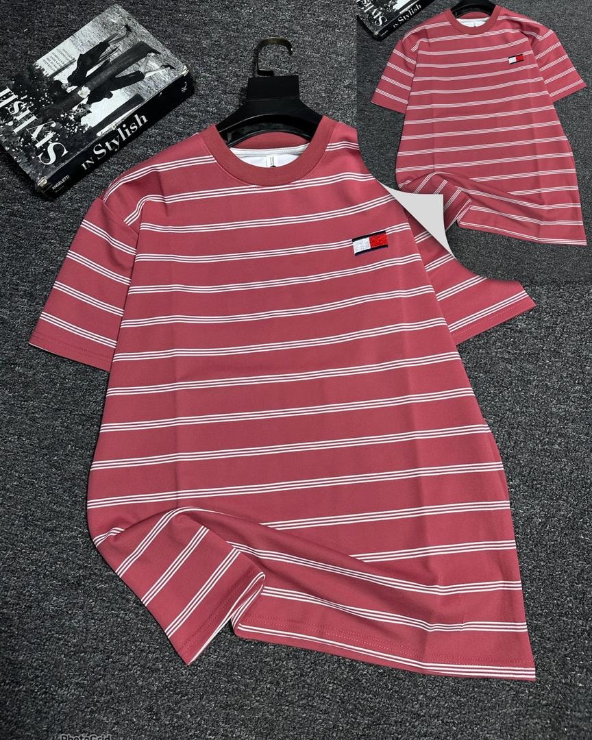 Red and white striped oversized t-shirt with small chest logo.