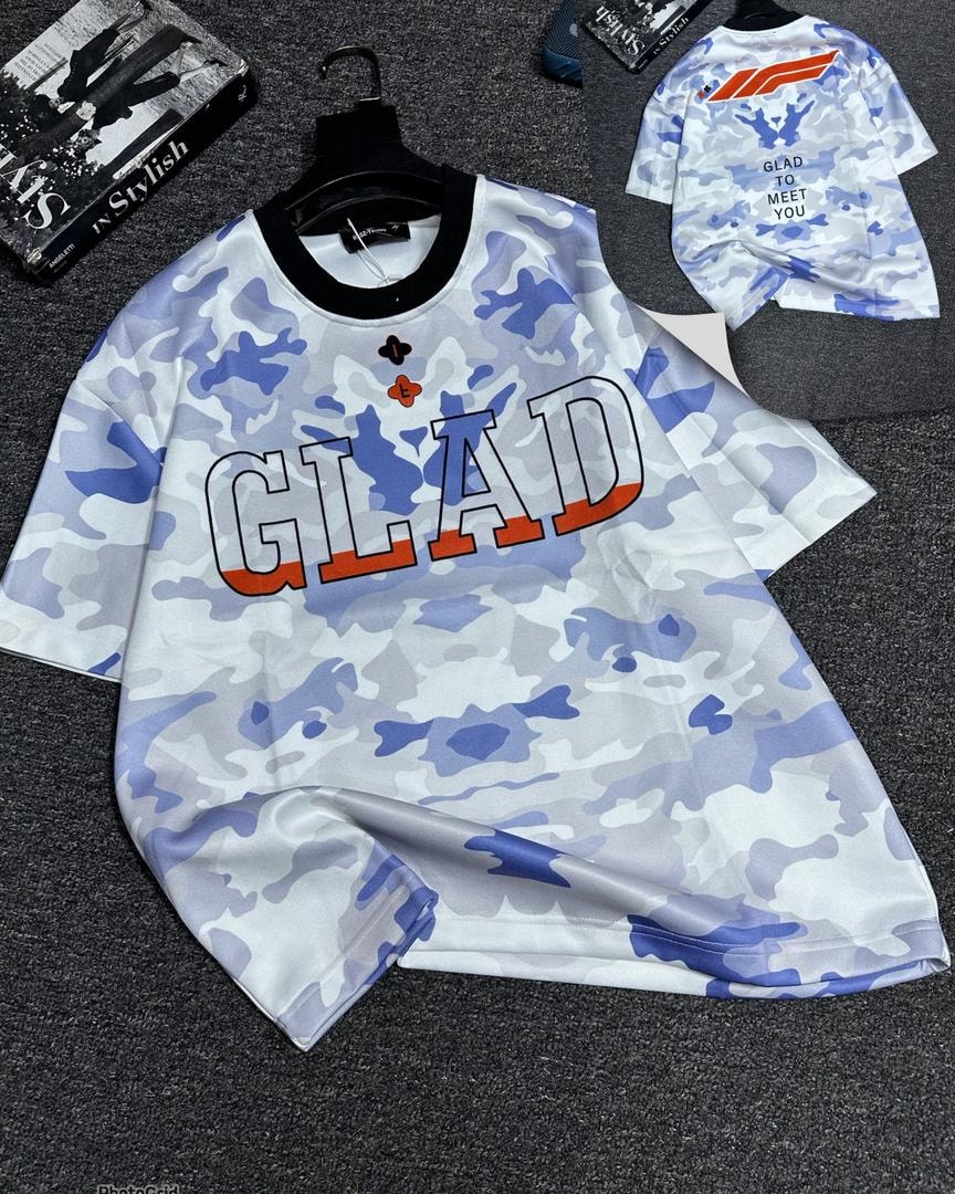 Oversized t-shirt in blue camouflage with large GLAD graphic print on front and back inset.