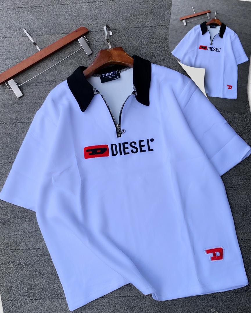 White Diesel quarter-zip polo shirt on wooden hanger with props.