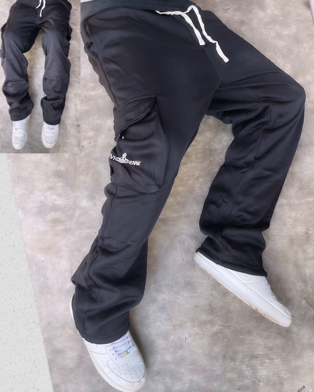 Black cargo joggers with Vivienne embroidery on thigh, cargo pocket and white drawstring paired with white sneakers.