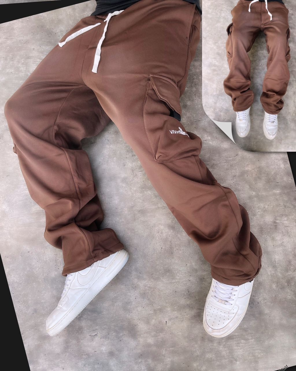 Brown cargo joggers with Vivienne embroidery, white drawstring and cargo pockets worn with white sneakers.