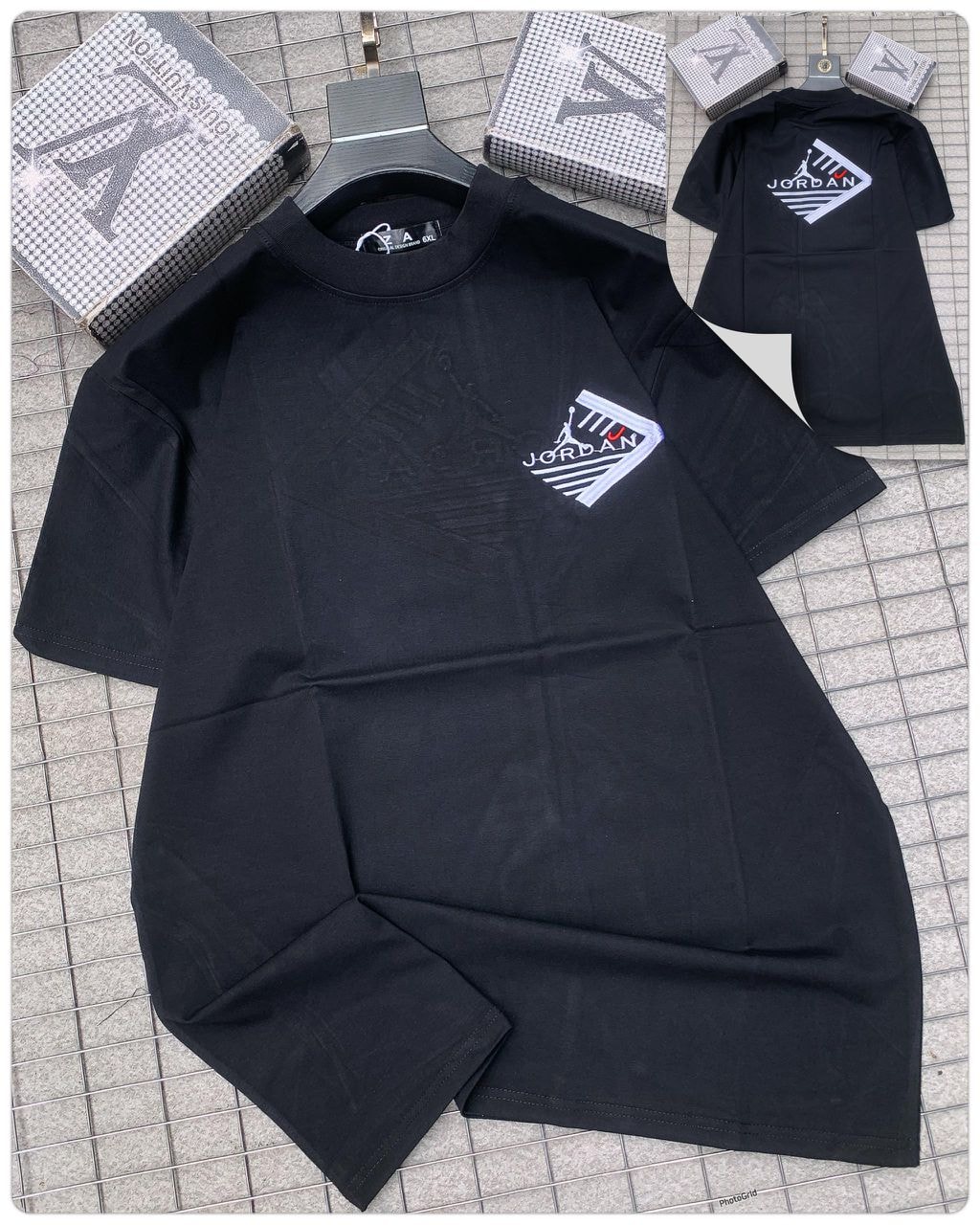 Black Jordan logo round neck t-shirt with chest graphic.