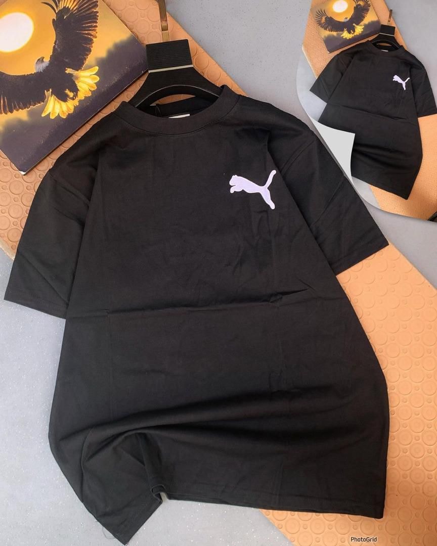 Black Puma round neck t-shirt with white logo on chest.