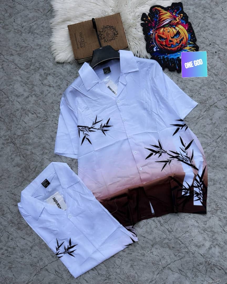 Gradient shirt and shorts with bamboo prints on gray background.