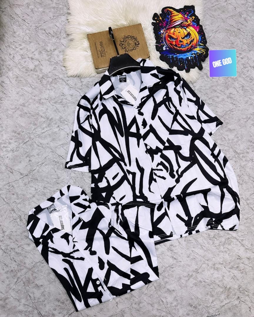 White short sleeve shirt and shorts with black abstract graffiti line pattern.