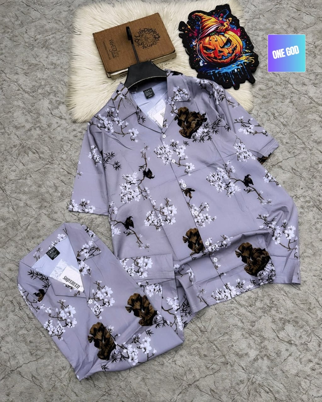 Lavender short sleeve shirt and shorts with white floral branches, brown flowers and birds.