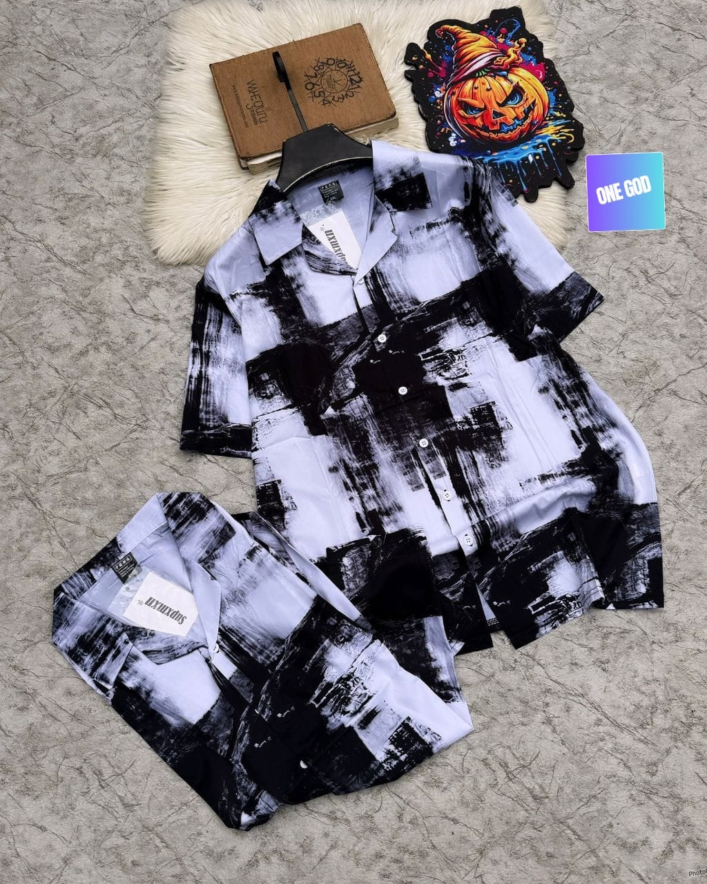Black and white abstract brushstroke pattern short sleeve shirt and matching shorts set.