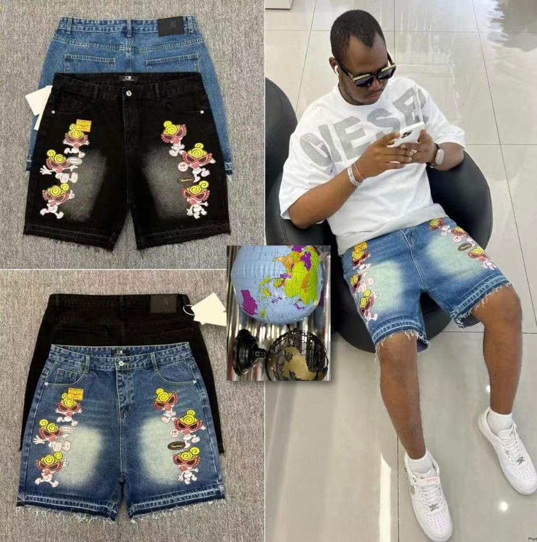 Collage of black and blue denim shorts with colorful cartoon prints and model wearing the blue pair.