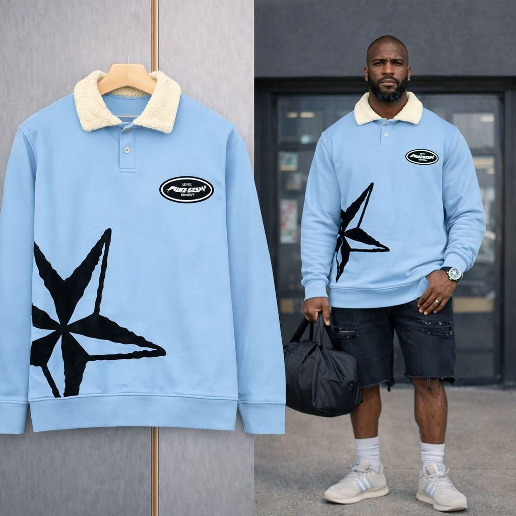 Light blue polo sweatshirt with black star graphic on hanger and model.