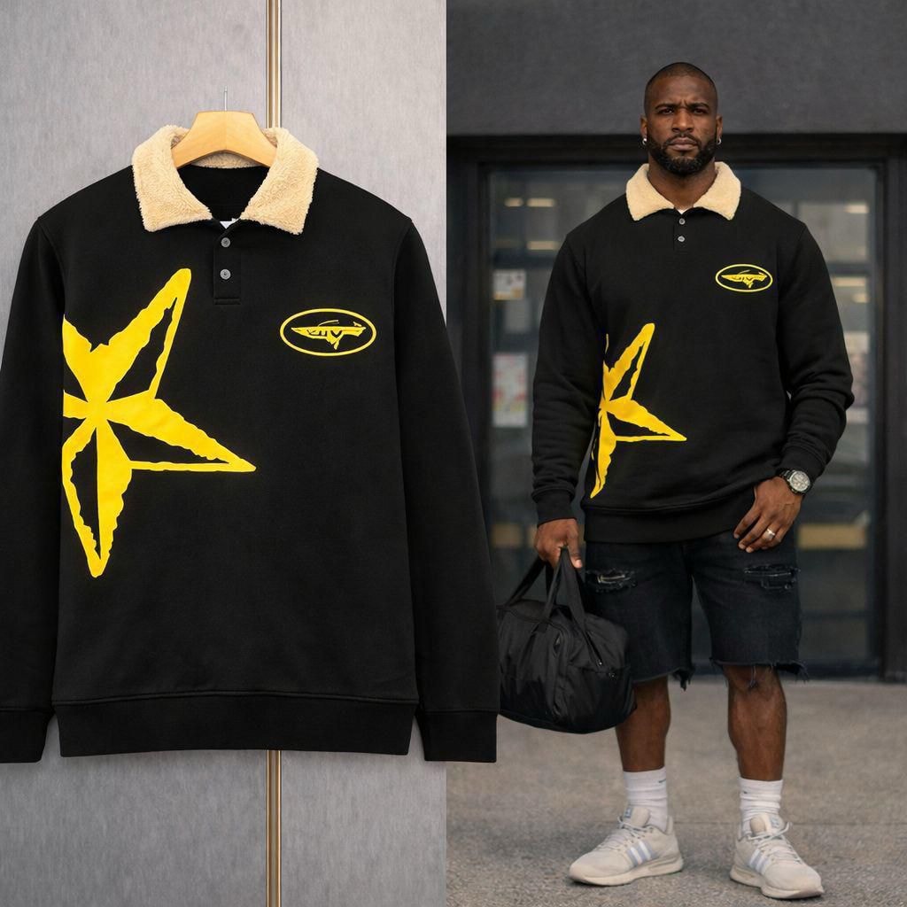 Black polo sweatshirt with yellow star graphic on hanger and model.