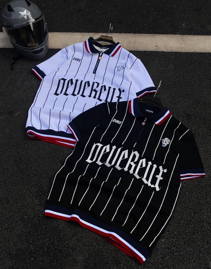 White and black striped polo shirts displaying 'neueReux' gothic print and skull emblems.