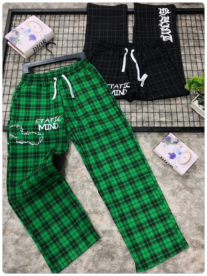 Green plaid joggers with Static Mind print displayed alongside black variants.