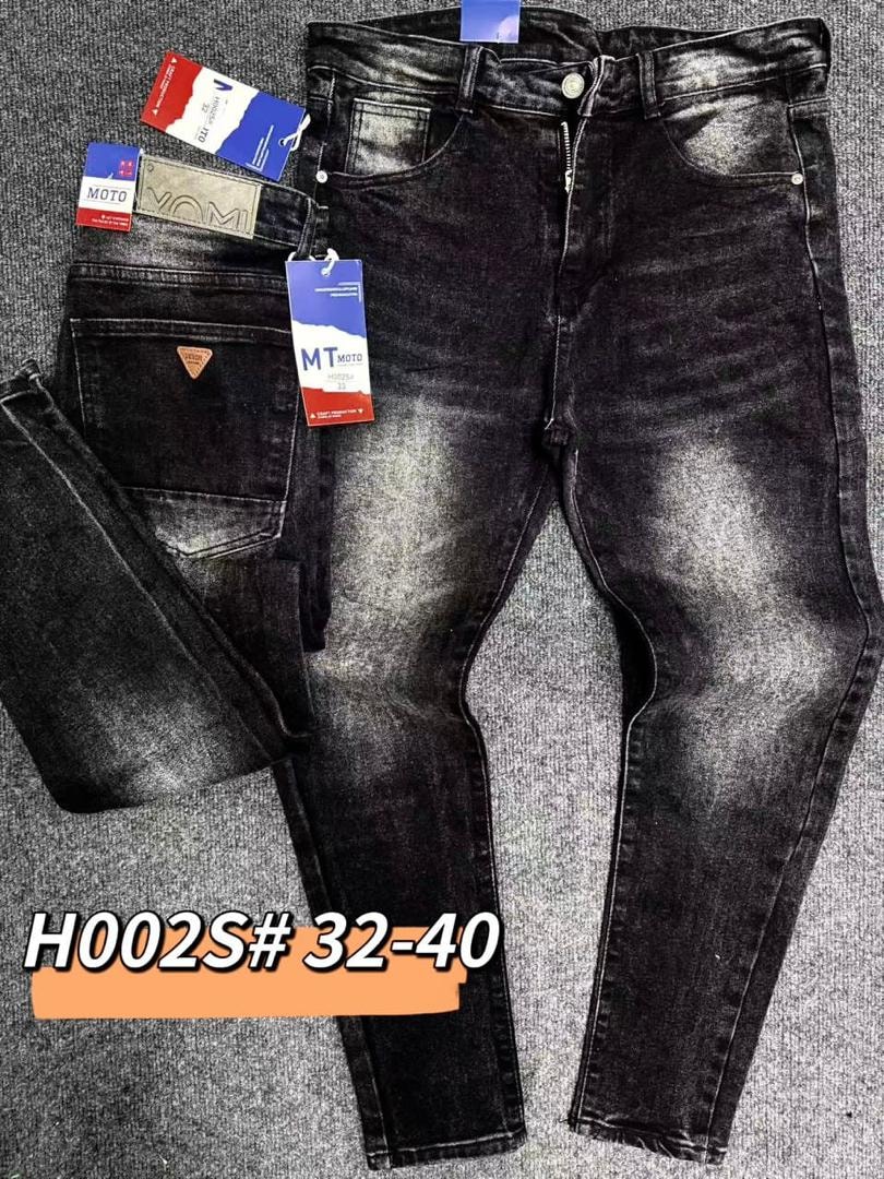 Faded black men's jeans with MT Moto tags, labeled H002S#32-40.