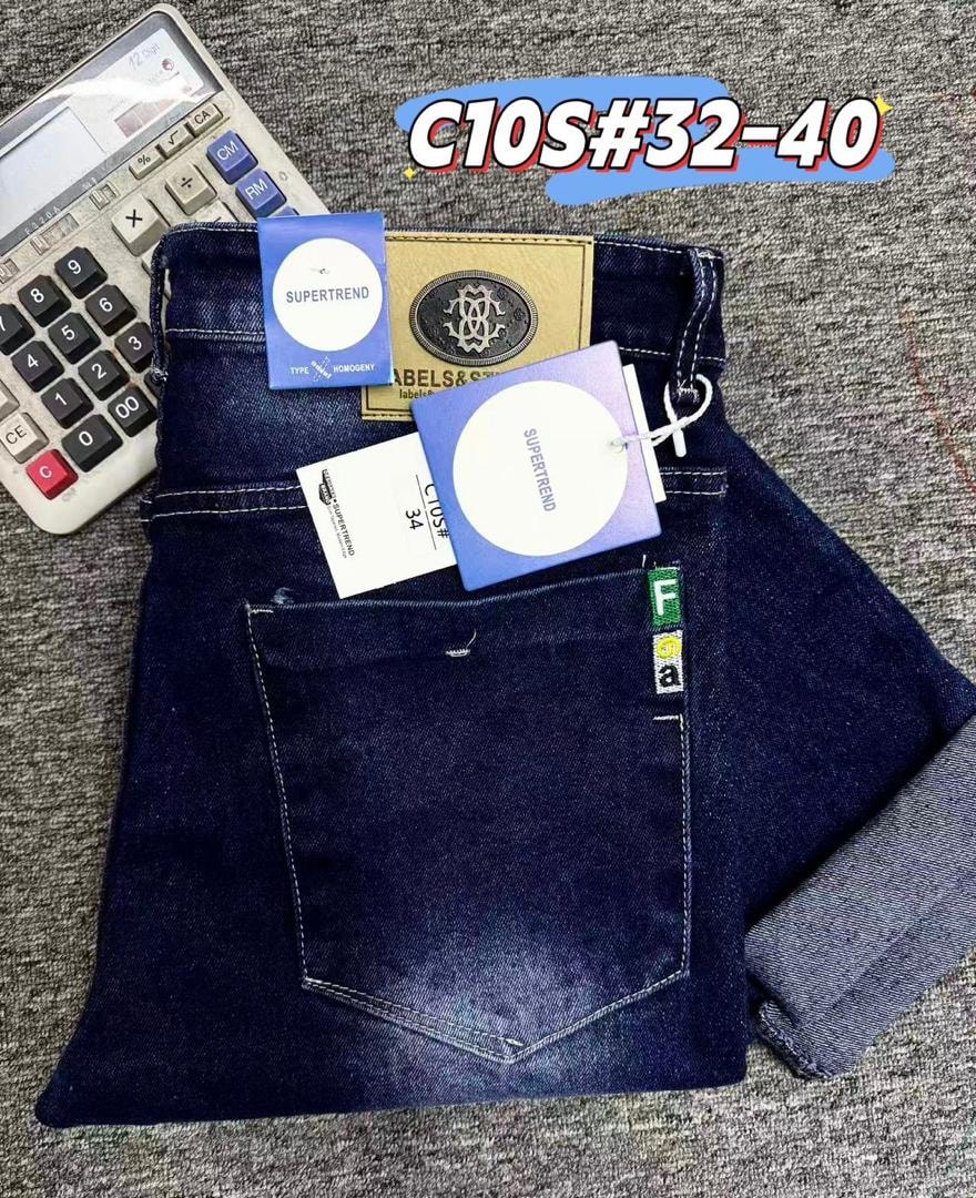 Dark navy men's jeans with Superttrend and labels, shown with calculator, labeled C10S#32-40.