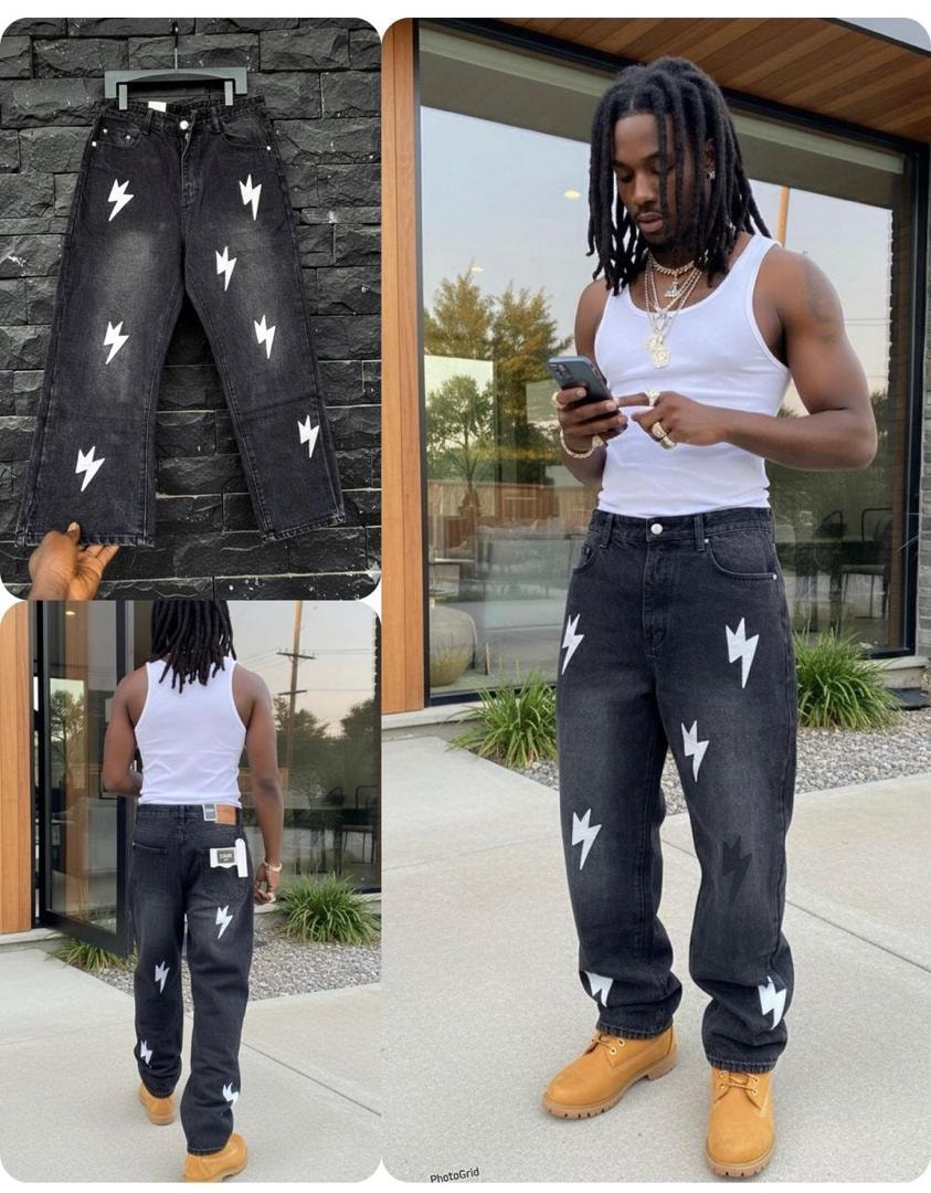 Black baggy jeans with white lightning bolt graphics, shown on model front and back plus flat lay.