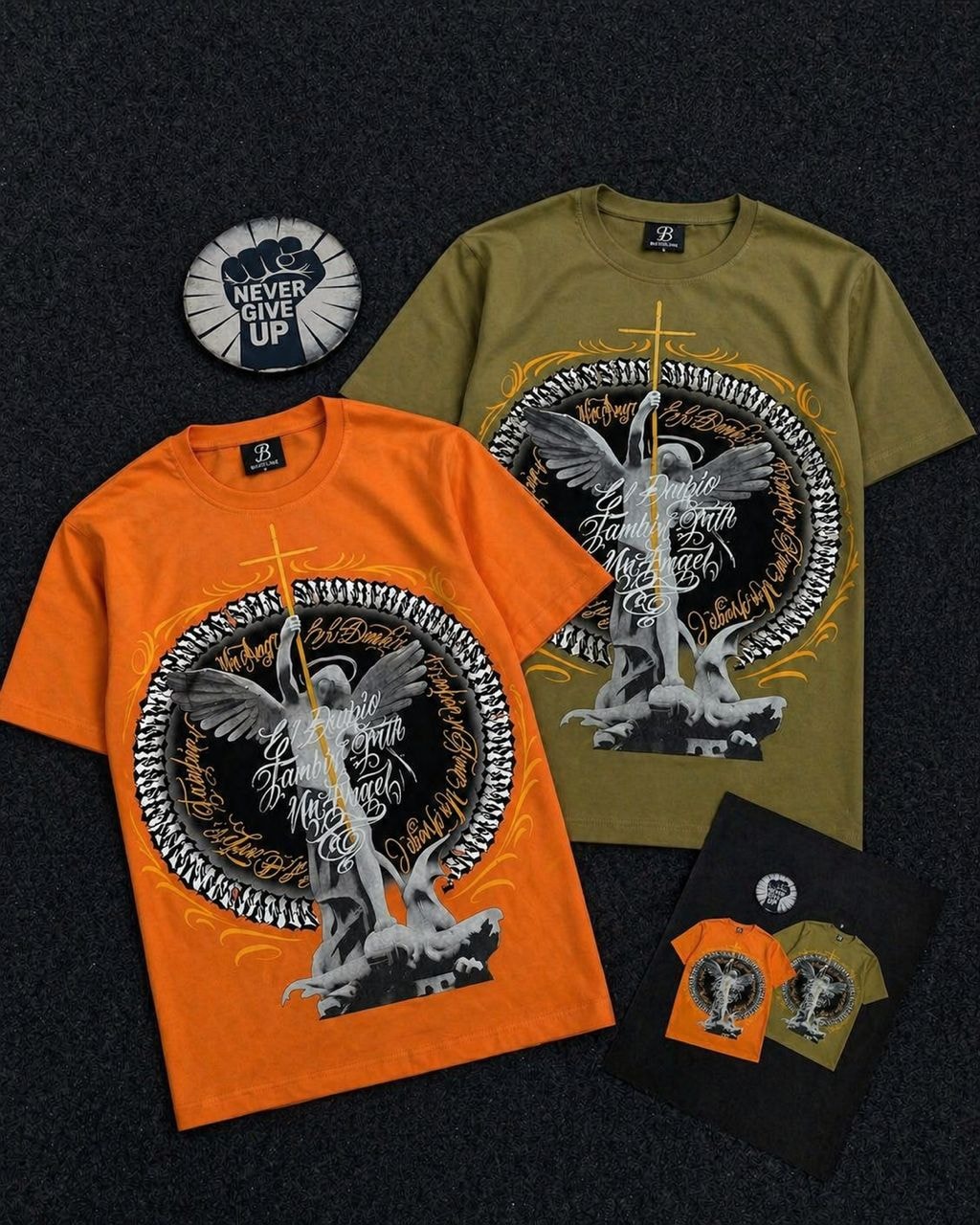 Orange and olive angel graphic tees with cross and text design.
