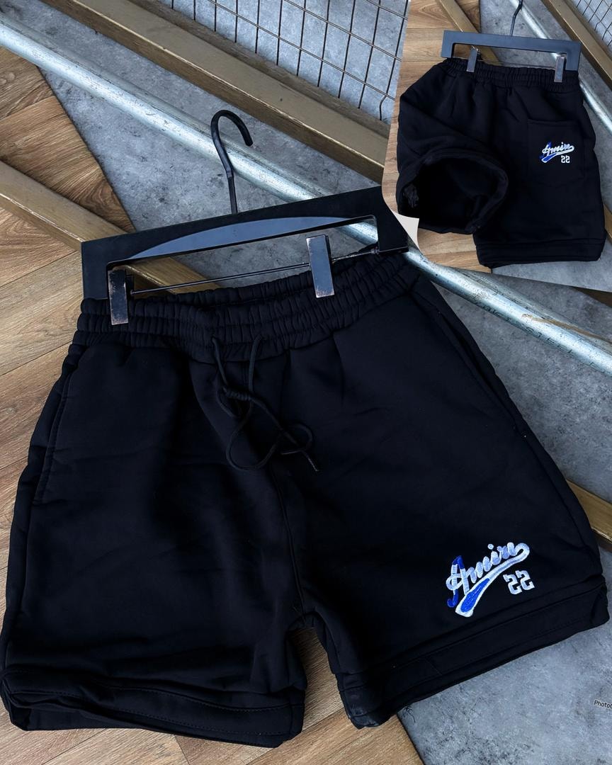 Black unisex fleece shorts with Amour 22 embroidery on leg and back pocket.