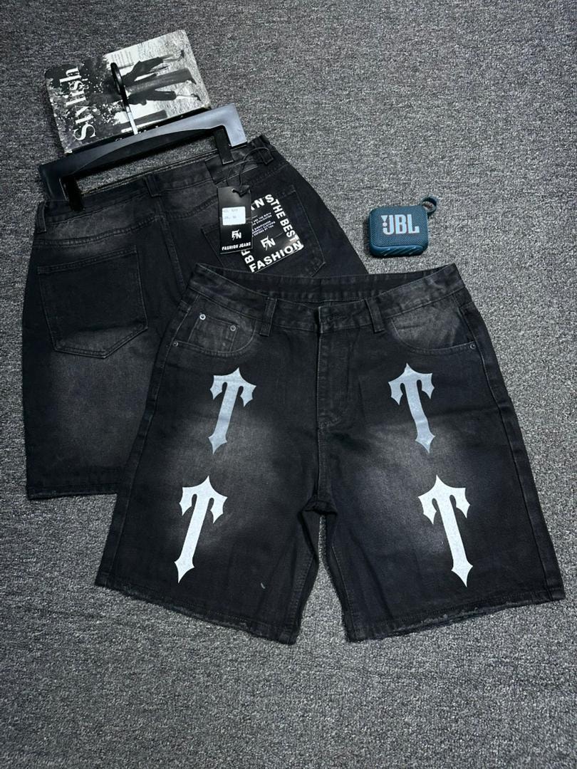 Black baggy denim shorts with white cross graphics on front and back view displayed flat.