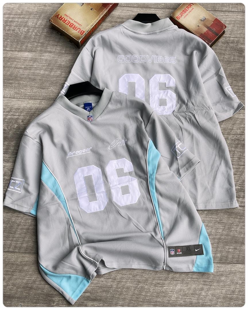 Gray Goodvibes 06 mesh jersey with contrast blue accents and branding details.