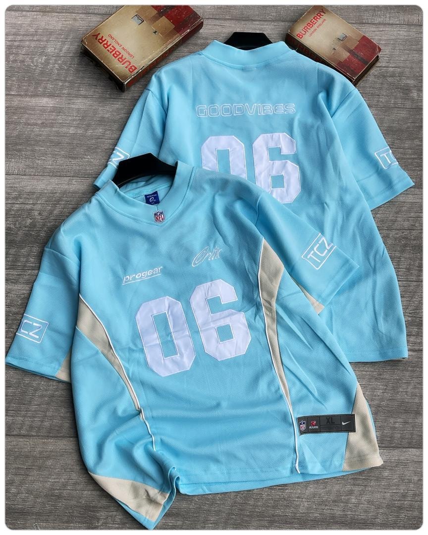 Light blue Goodvibes 06 mesh jersey displayed from multiple angles with NFL tag.