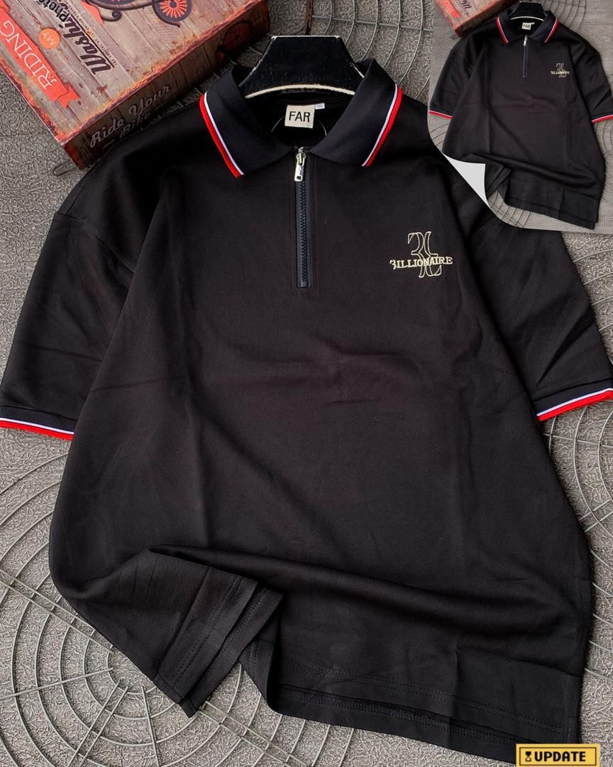 Black 3ILLIONAIRE quarter-zip polo shirt on patterned background showing logo and striped trim.