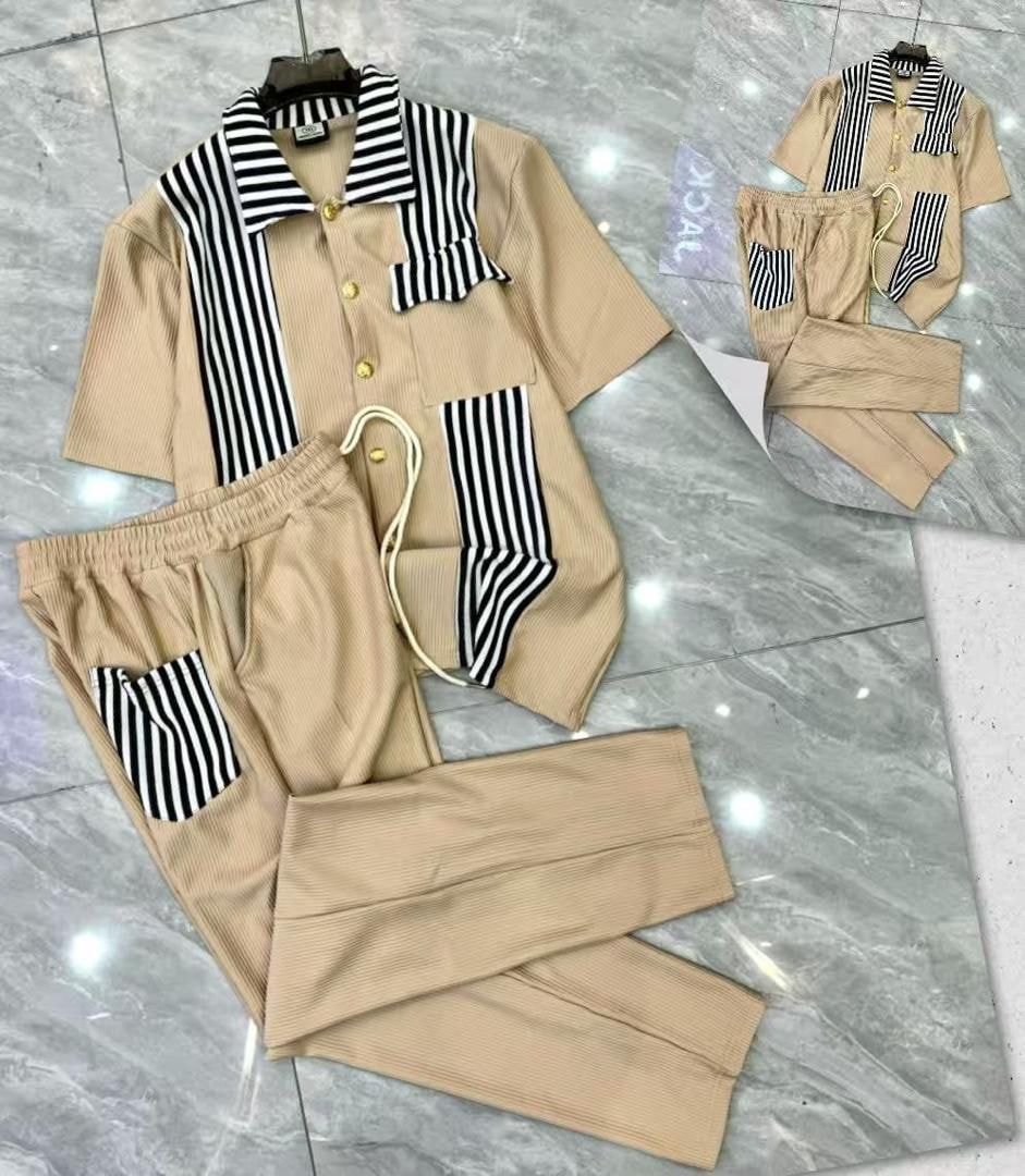 Beige ribbed button-up shirt and pants two-piece set with black and white stripes.