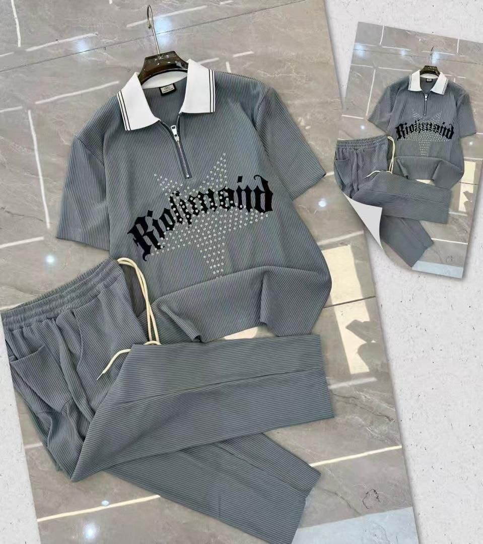 Gray ribbed zip polo and pants two-piece set with Richmond graphic on tiled floor.