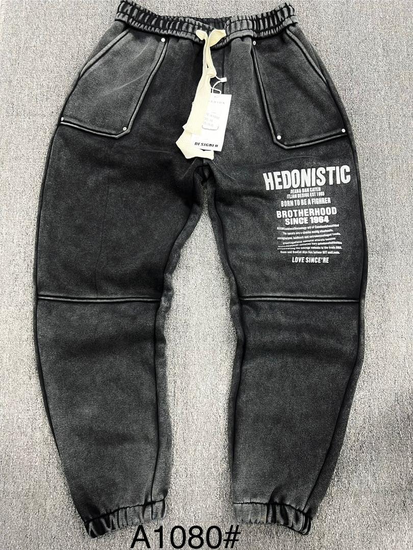 Gray Hedonistic graphic joggers with text print on thigh.