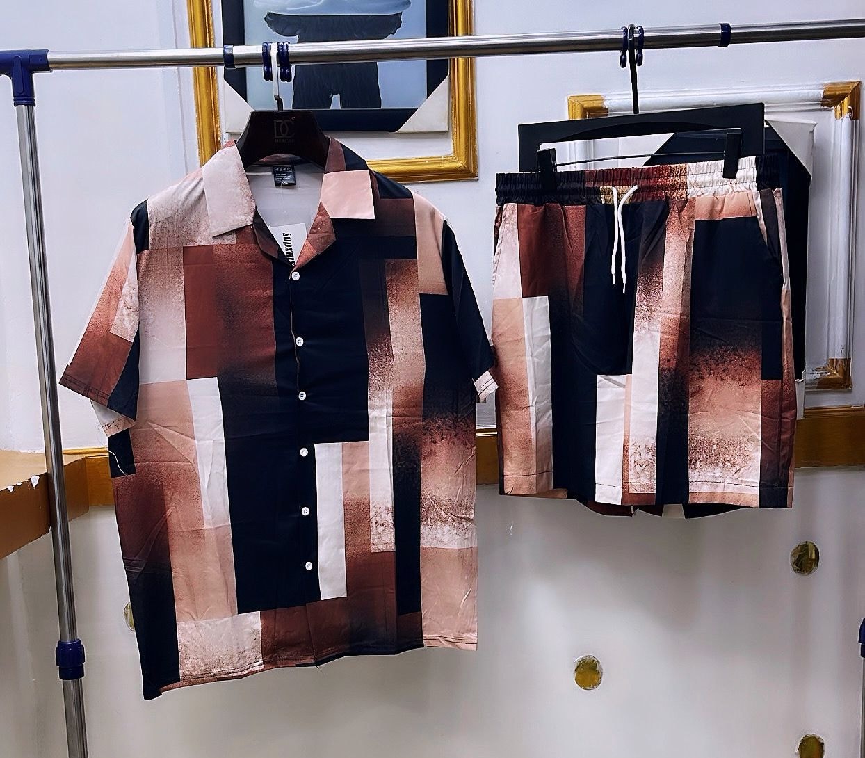Black shirt and shorts set with brown beige and white striped abstract print.