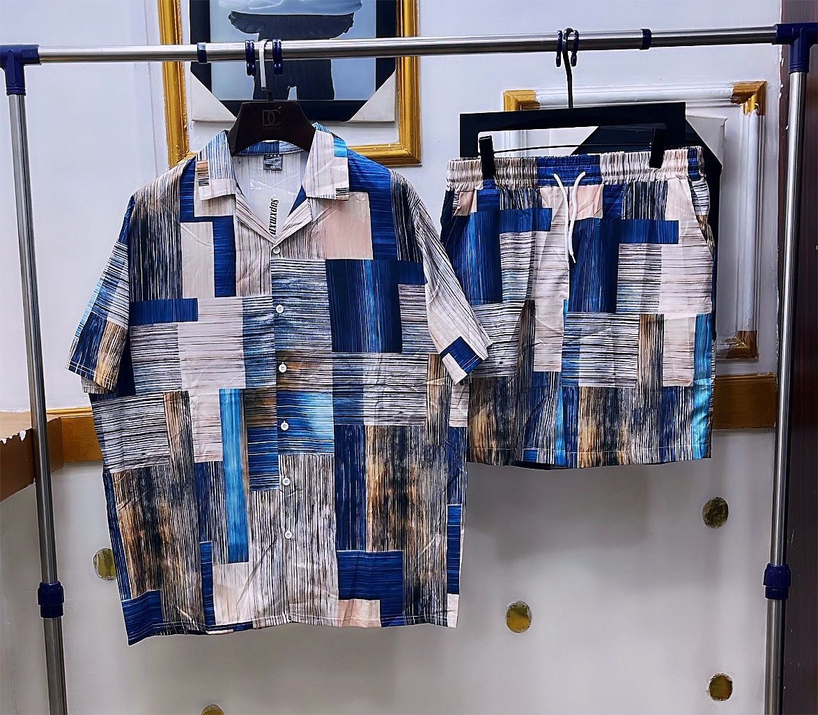 Multi blue shirt and shorts set with abstract block and line print.