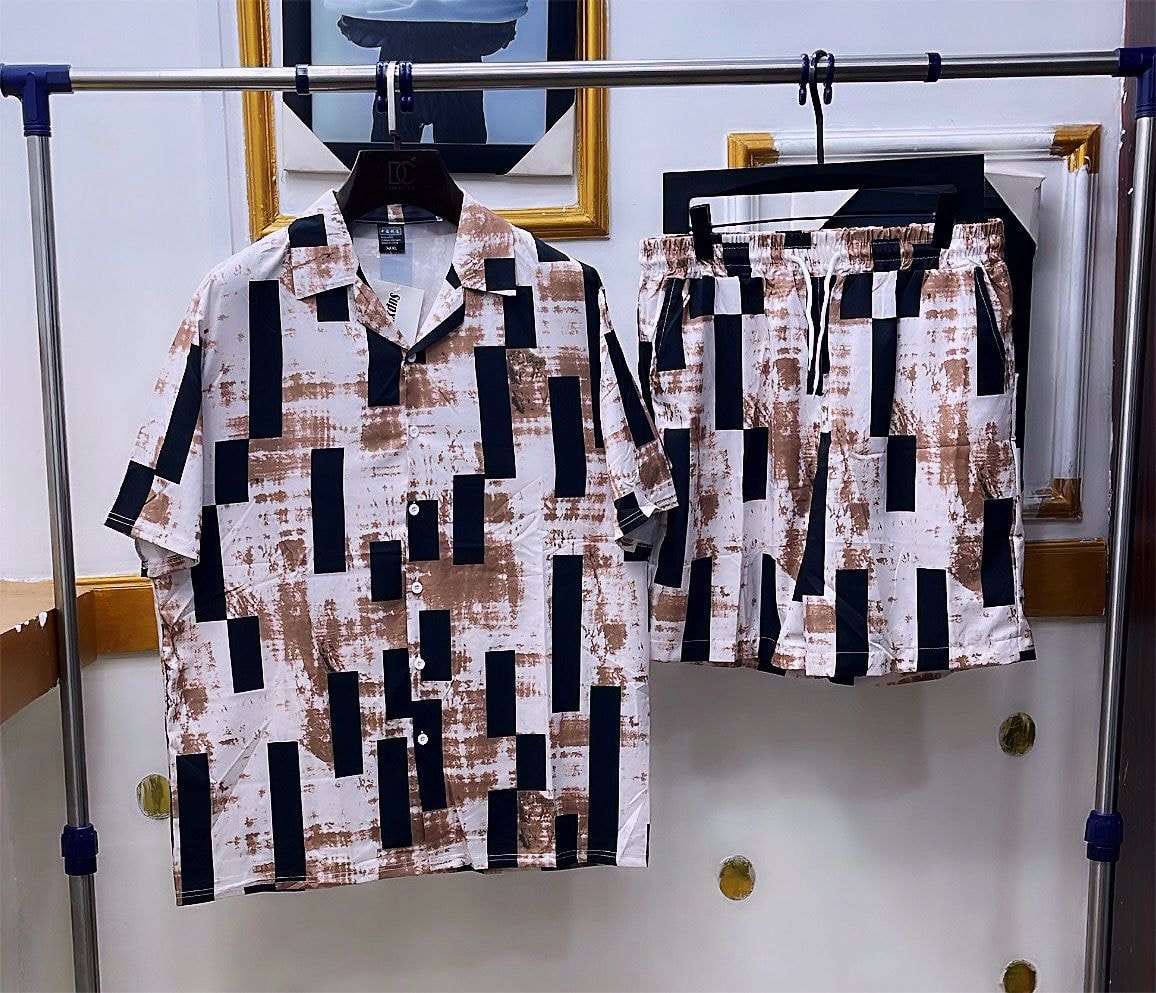 White shirt and shorts set with brown and black geometric block print.