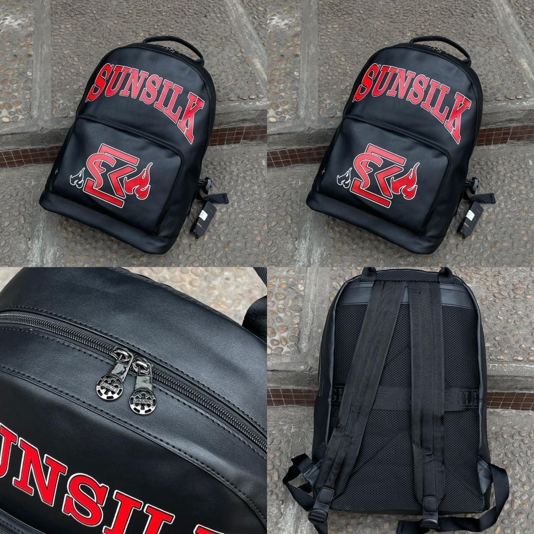Black Sunsilk backpack displayed from multiple angles with front graphic, zip details and back panel.