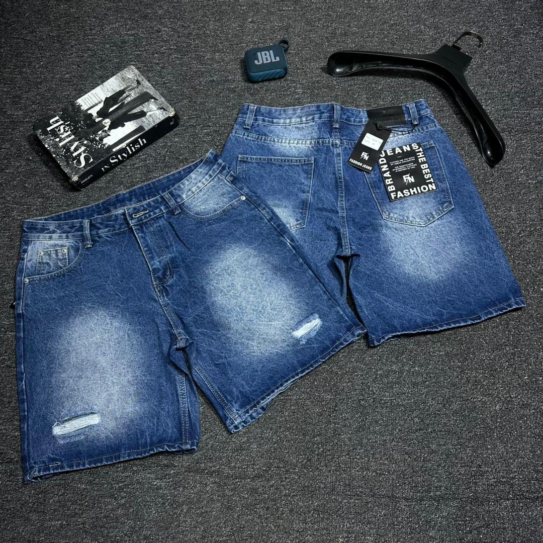 Blue denim shorts with heavy fading, distressed rips and patches, front and back views.