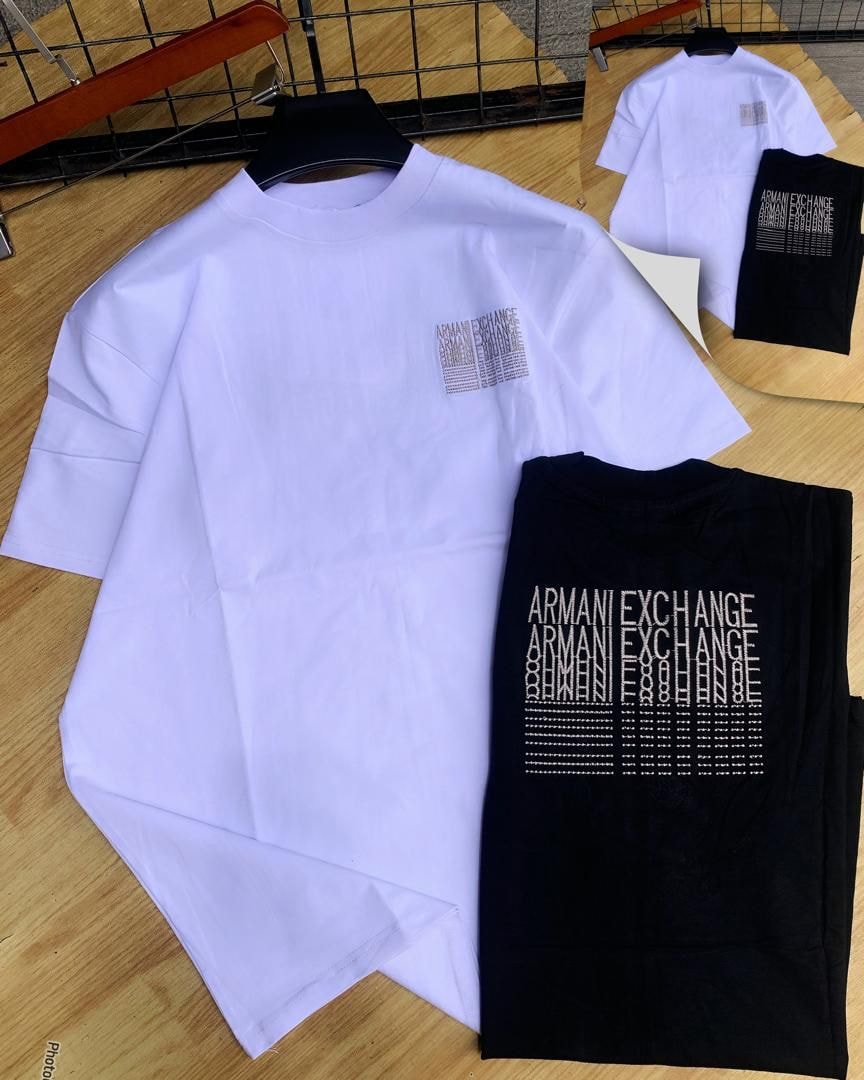 White and black Armani Exchange text print t-shirts with insets.