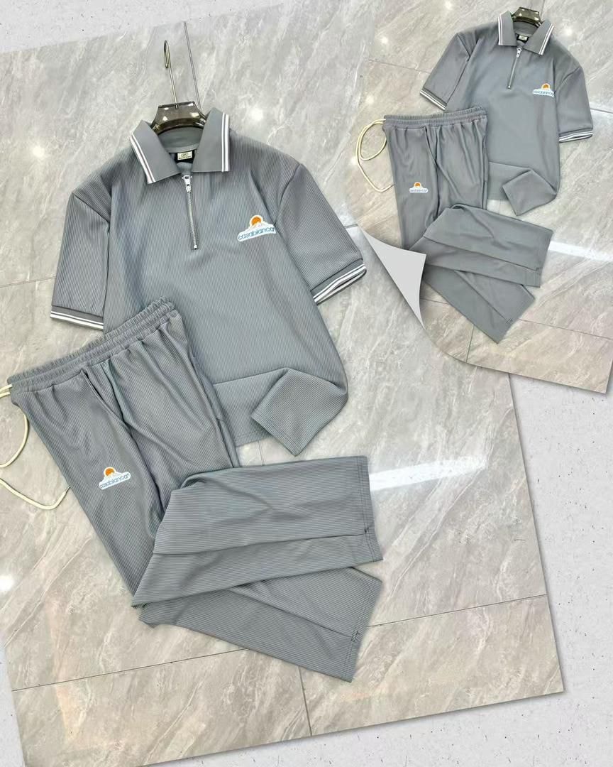Gray Casablanca polo and trousers two-piece set.