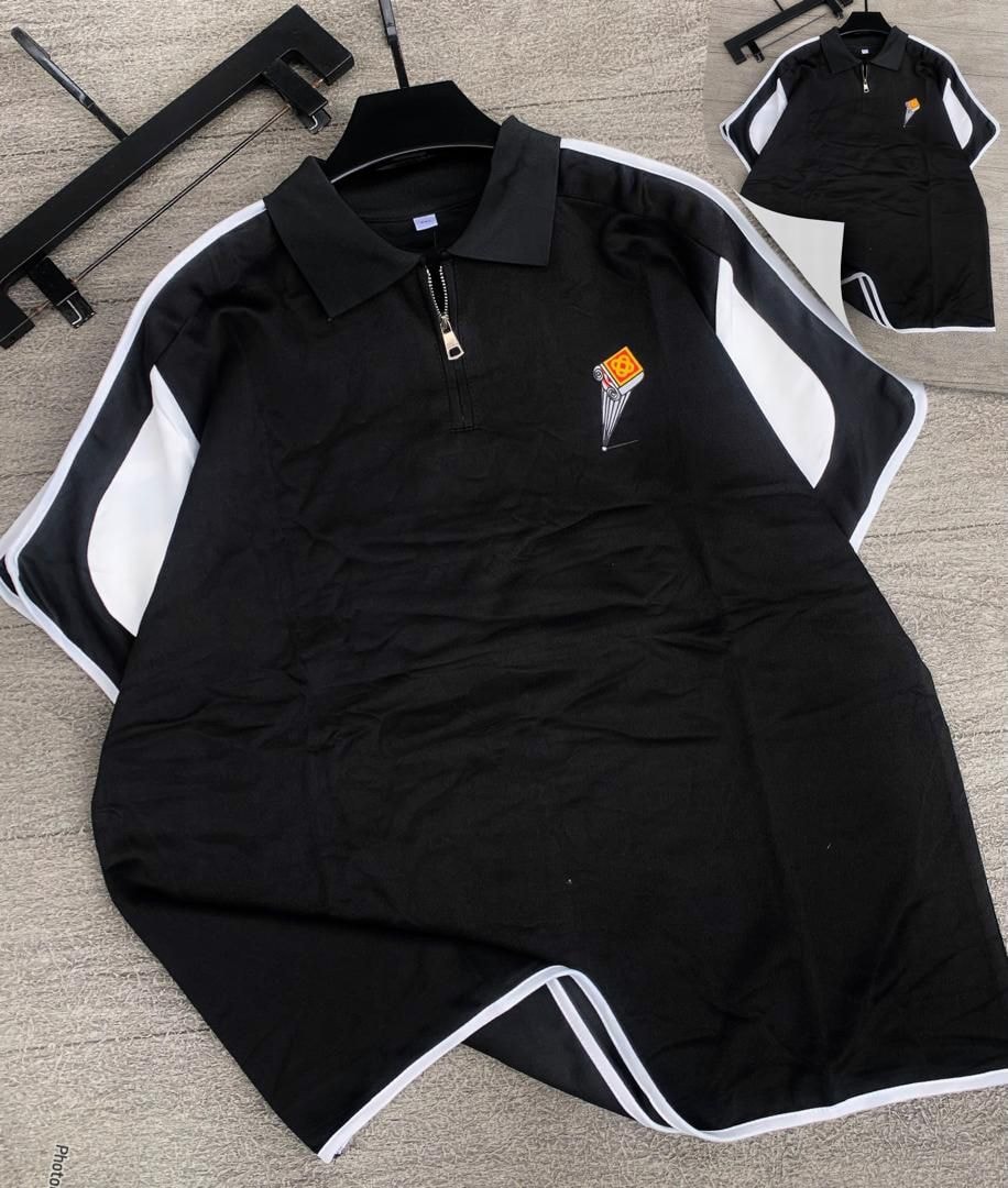 Black short sleeve zip polo shirt and matching shorts with white contrast panels.