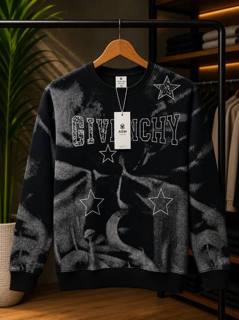 Black and gray bleached Givenchy star graphic sweatshirt.