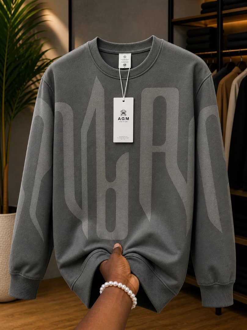 Gray sweatshirt with large light gray PARIS text graphics.