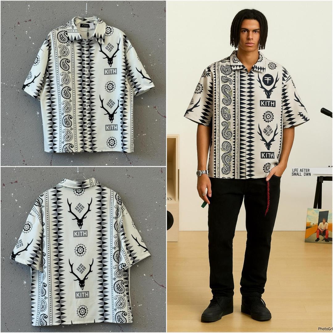 White short sleeve collared shirt with black geometric, paisley, and deer skull KITH print, flat lay and on model.