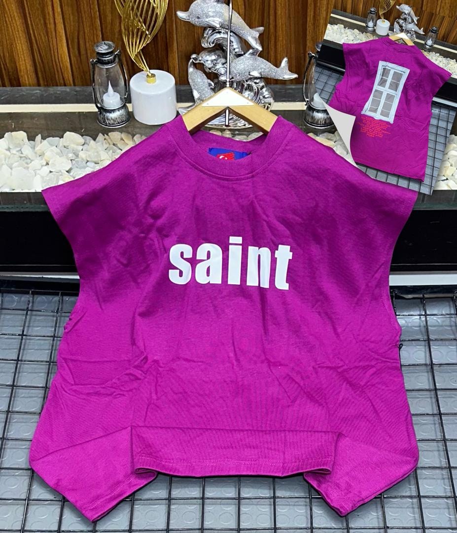 Purple oversized armless top with white saint text print on chest.