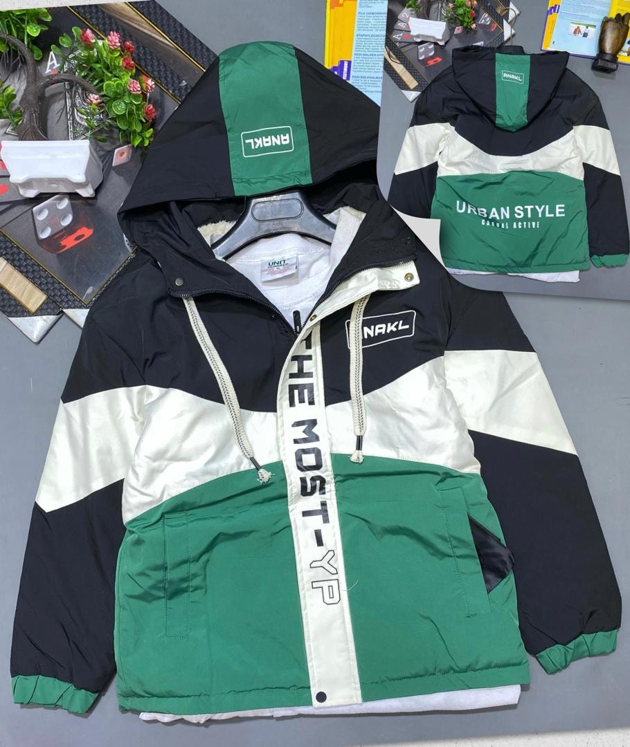 Front and back views of green black and white colorblock hooded winter jacket with NAKL logos and text prints.