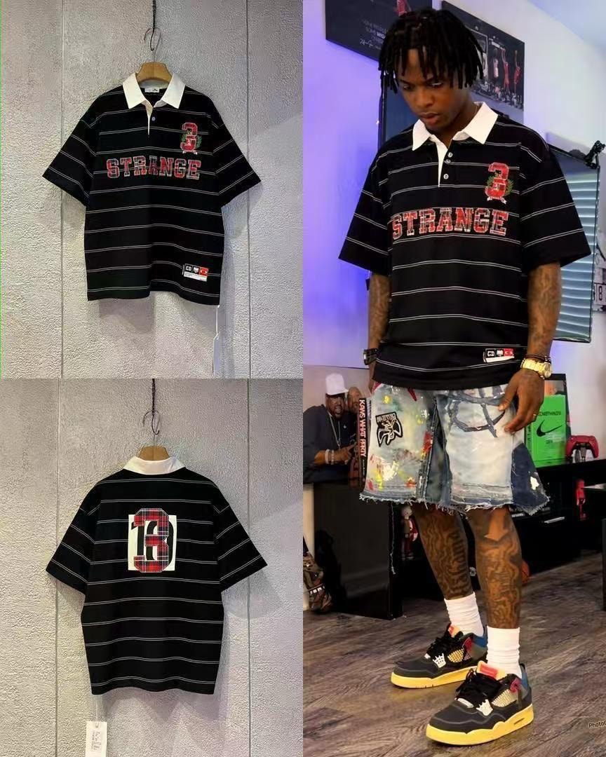 Black striped polo shirt with red STRANGE graphic, front back views and on model.