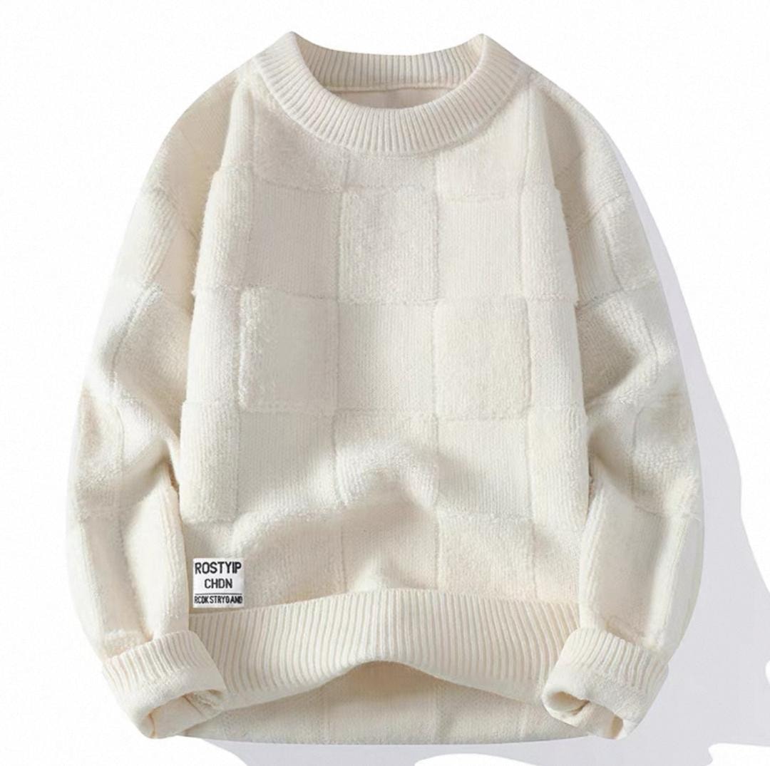 Cream sweatshirt with raised grid texture and ribbed cuffs and hem.