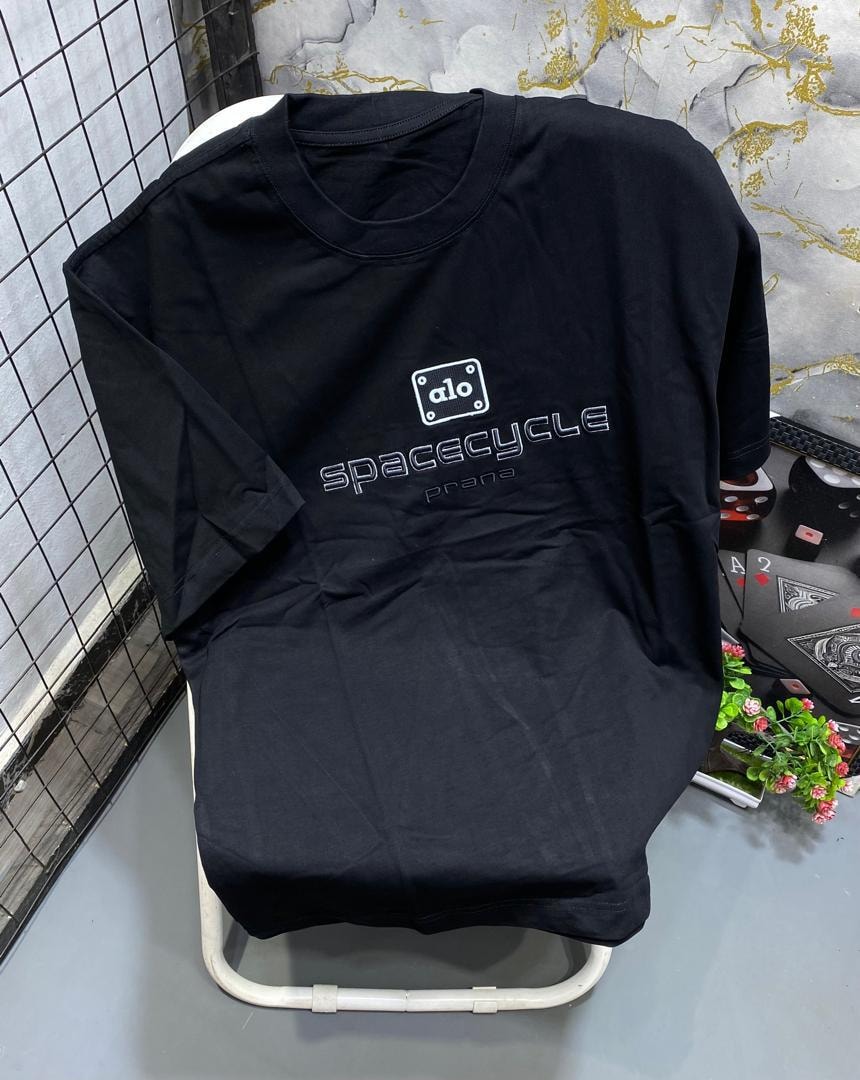 Black t-shirt with white alo spacecycle prana text and logo print.