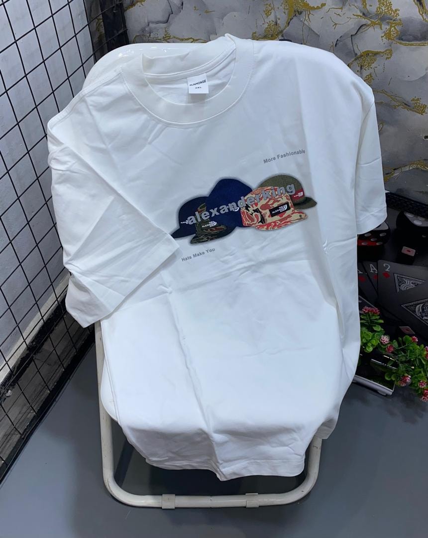 White t-shirt featuring colorful hats graphic with Alexander King text and slogans.