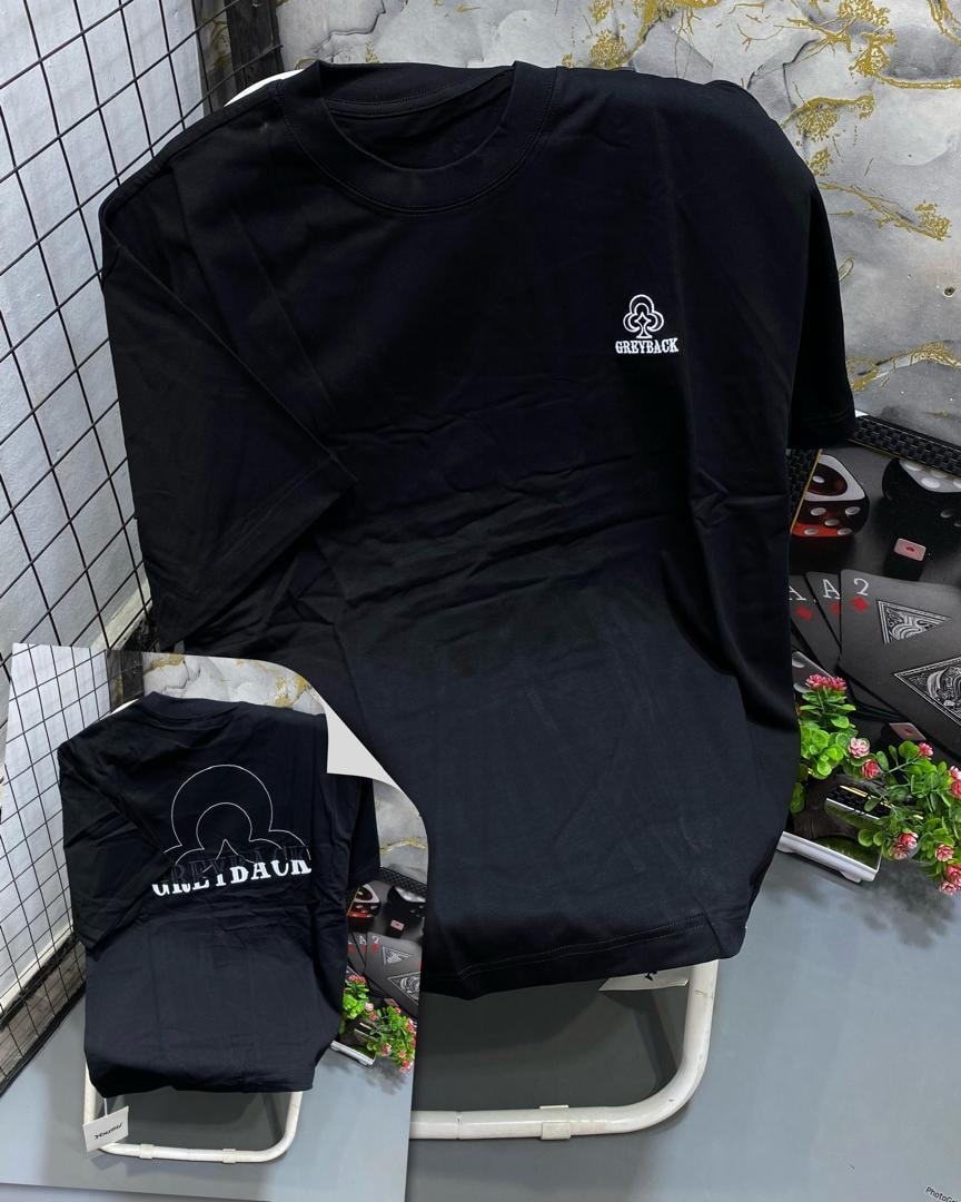 Front and back views of black t-shirt with Greyback clover logo.