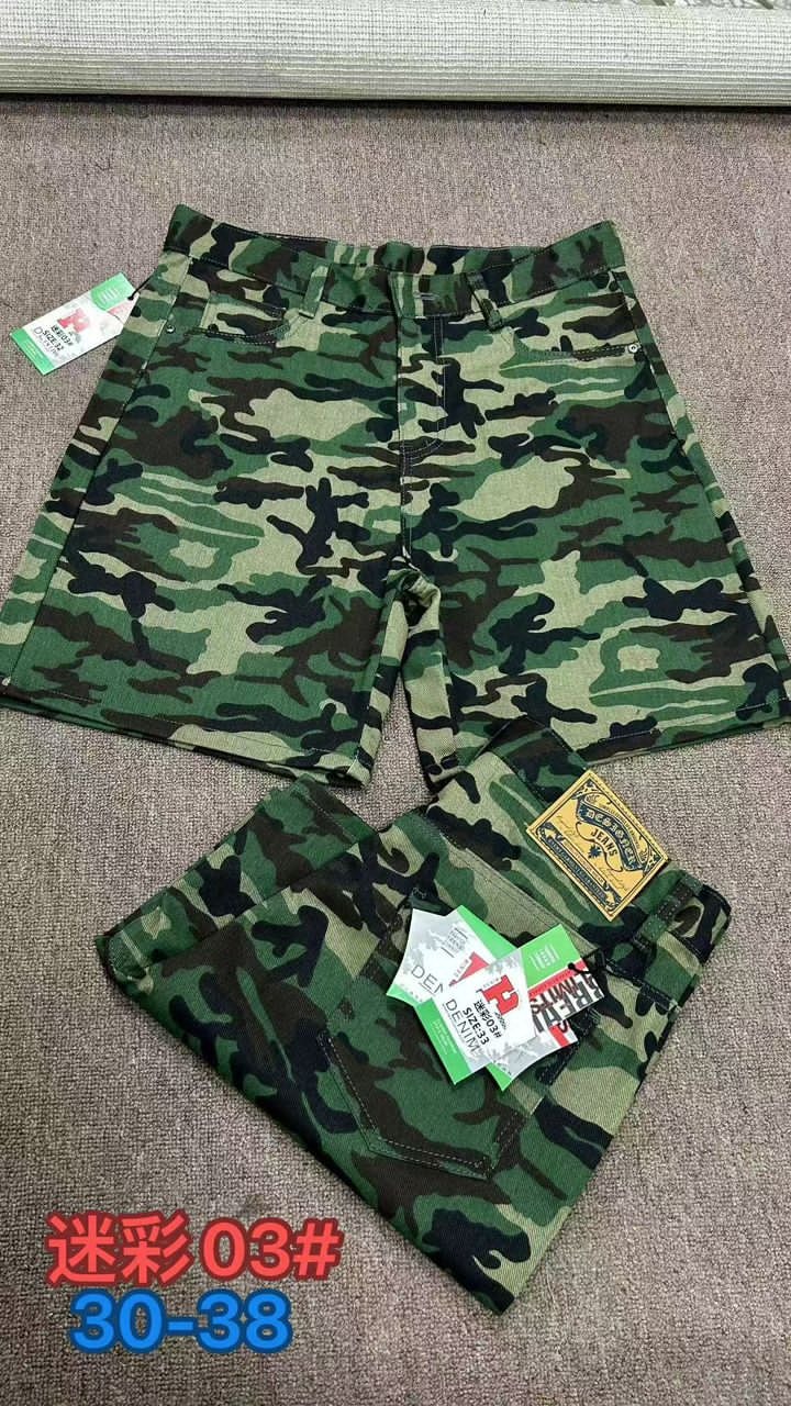 Green camouflage pattern denim shorts with tags and folded view.