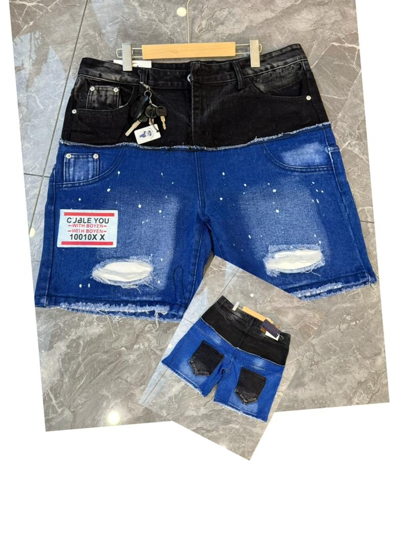 Two-tone black upper blue lower denim shorts with white splatters and inset view.
